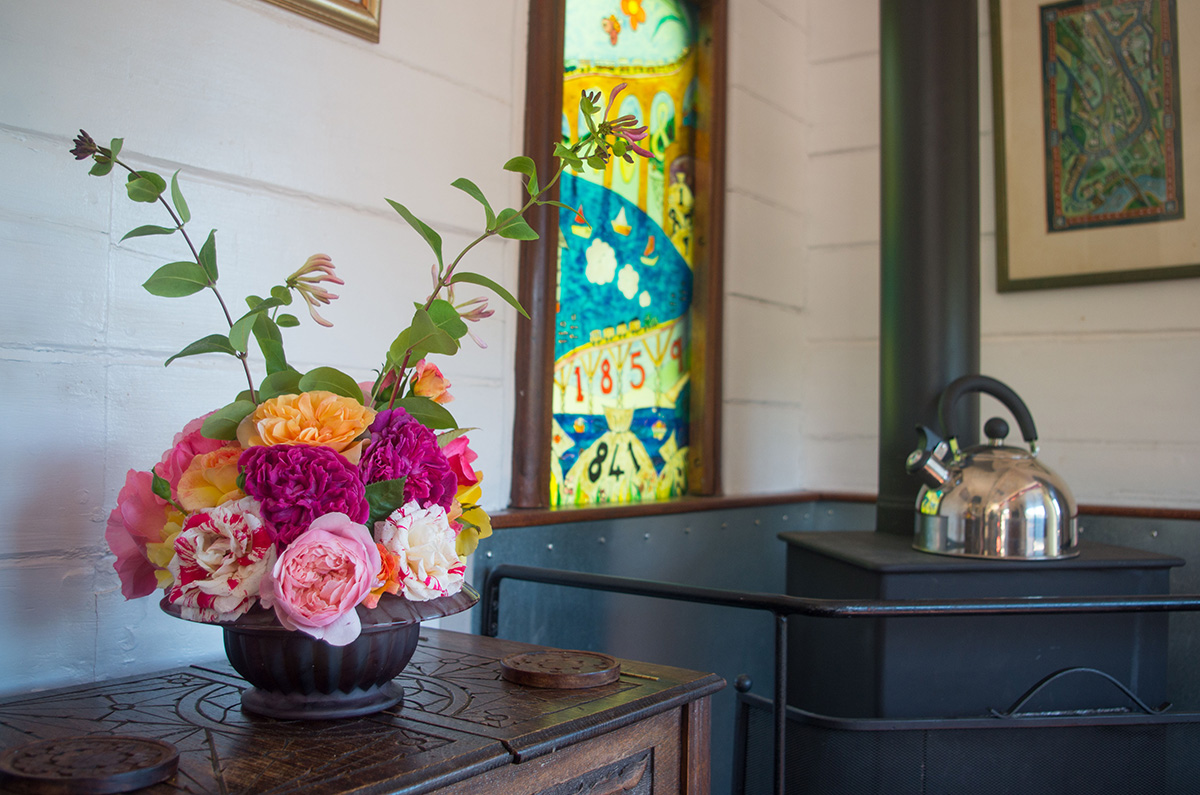 The Travelling Post Office flowers and stove